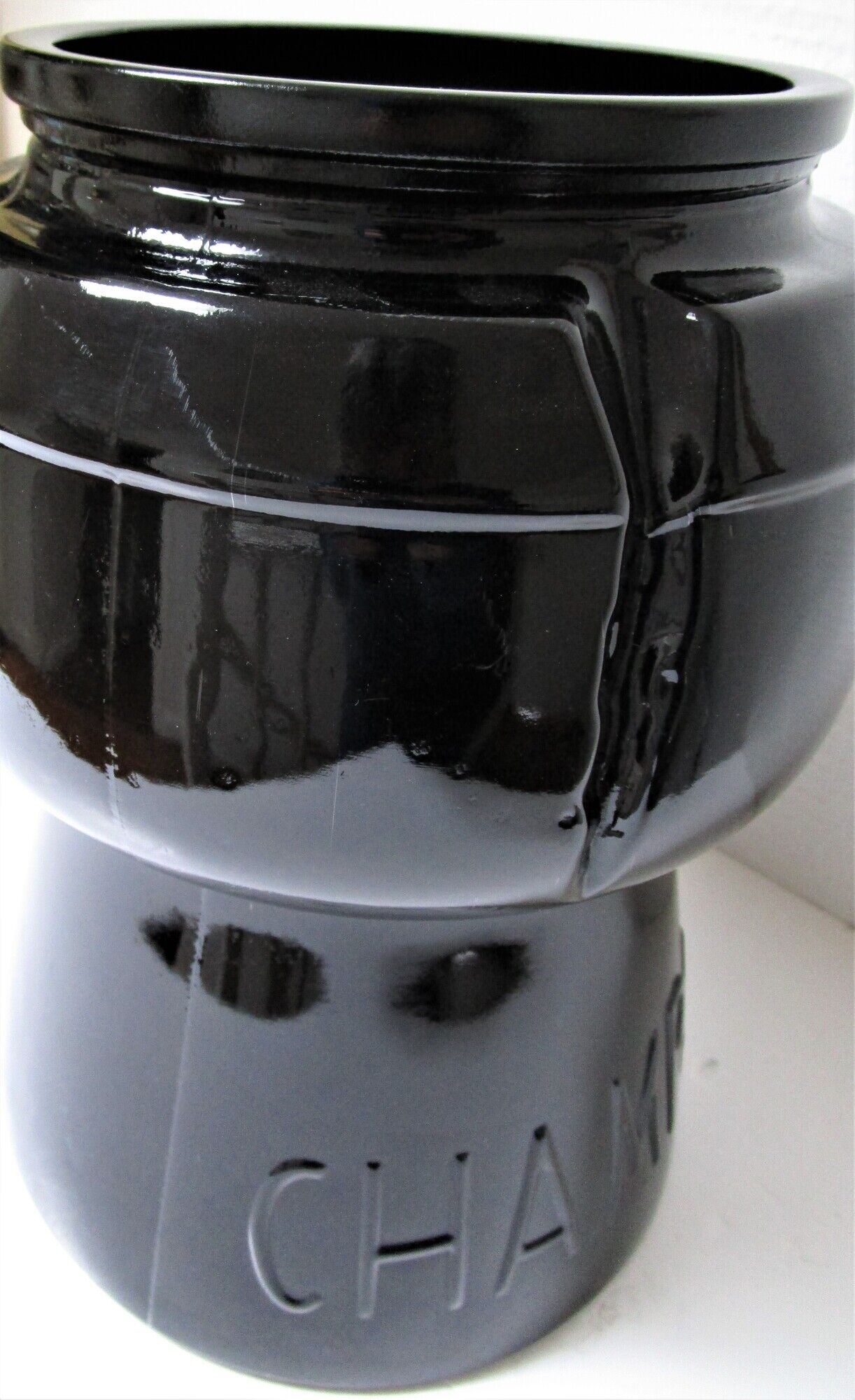 Champagne bucket design black glass in the shape of a 70s cork