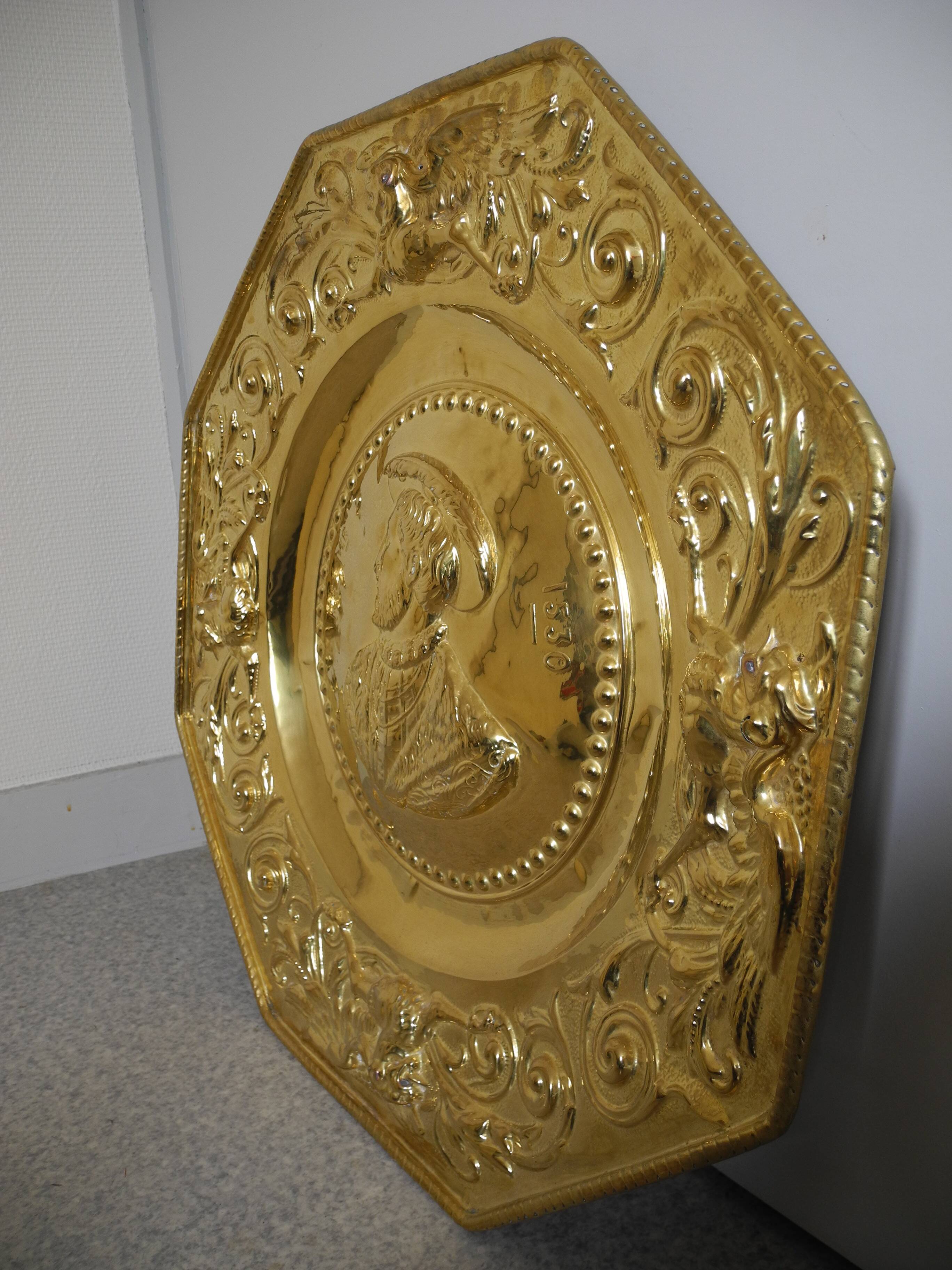 Offering dish in embossed brass by François I