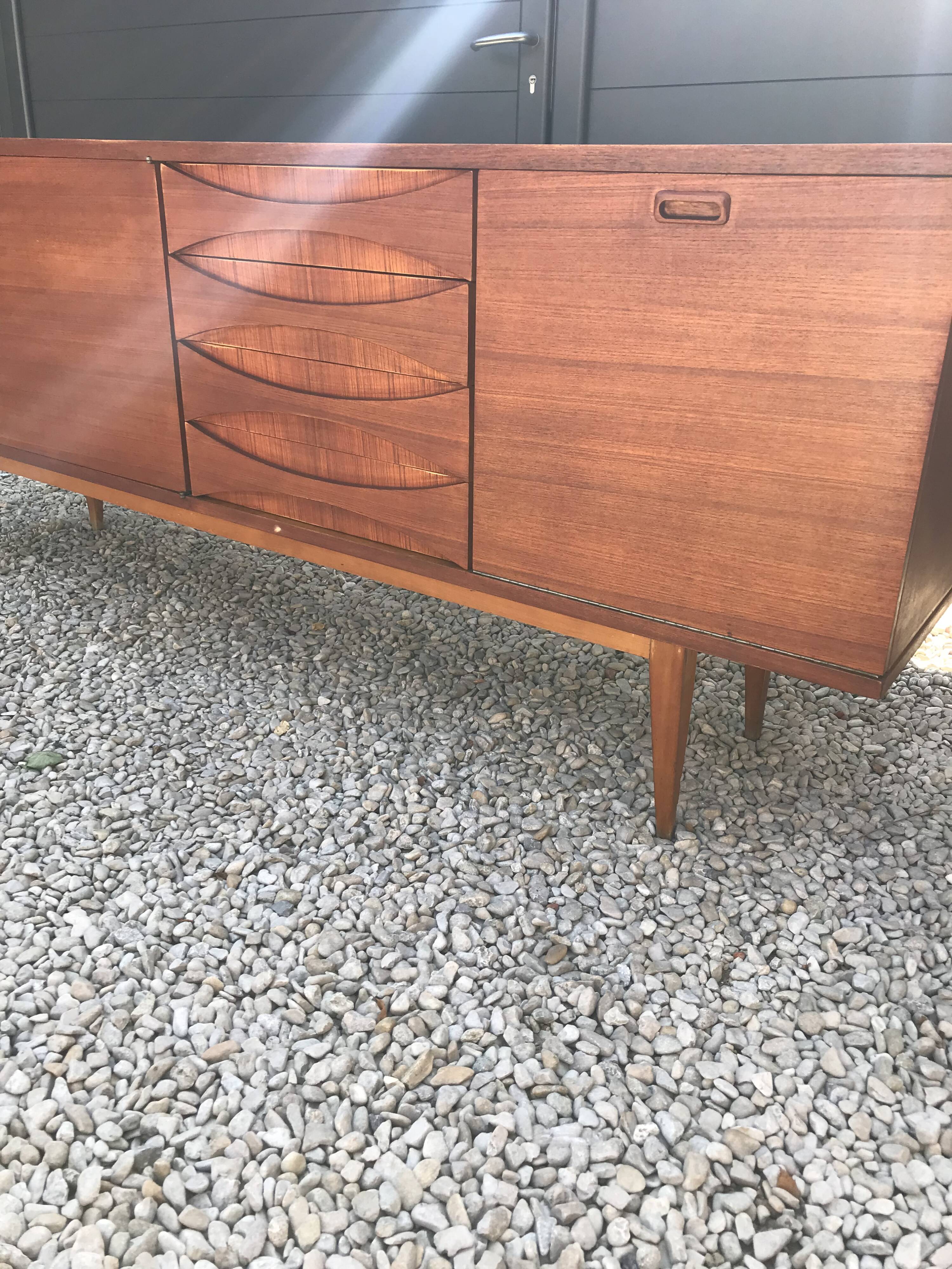 Eros row in scandinavian design teak