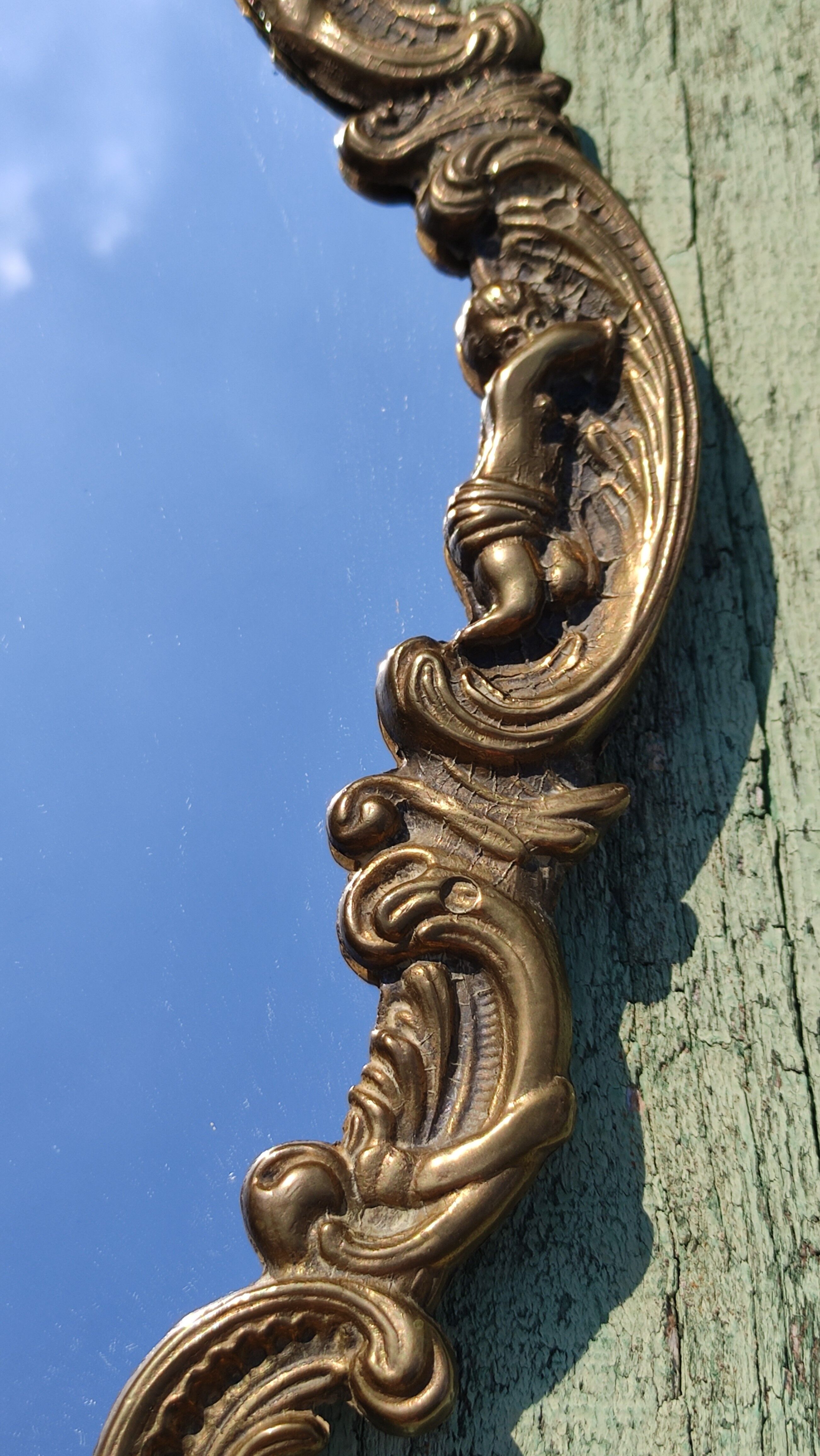 Vintage mirror in solid golden brass