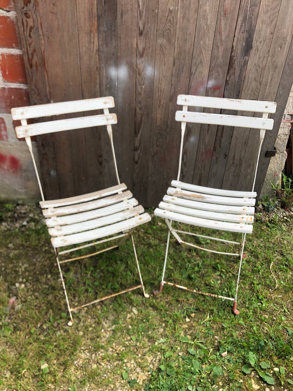 Pair of vintage white metal & wood folding garden chairs
