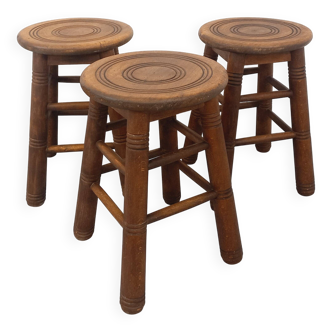 Set of three wooden stools from the 60s and 70s.