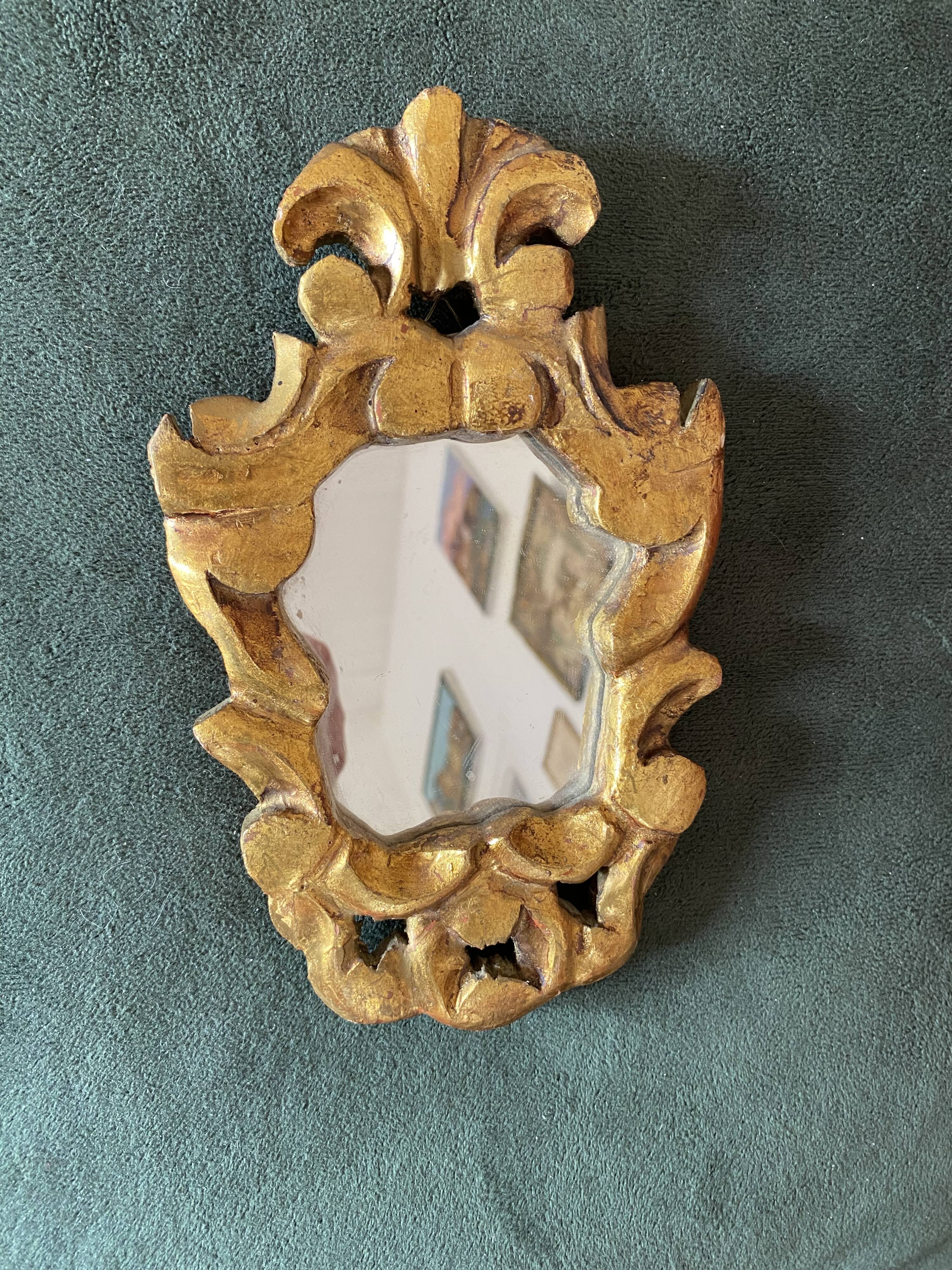 Small baroque gilded wood mirror.