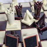 Original chess set in glazed terracotta, signed and numbered