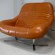 Sofa "space age". Leather, fiberglass, foam, steel. Circa 1970. Orange.