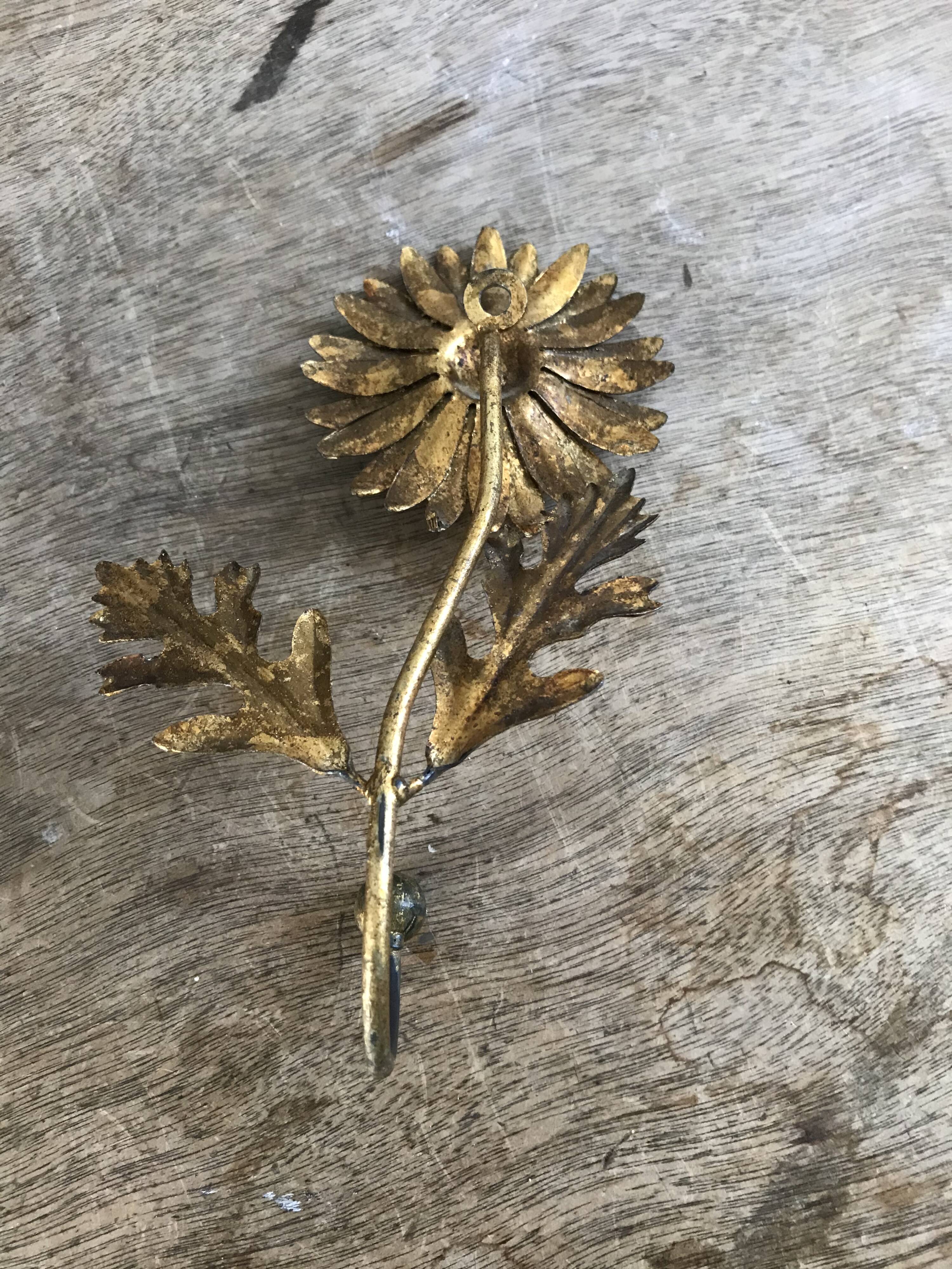 Brass flower patère