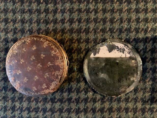 Very old round pocket mirror and leather case, 18th century