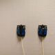 Wall lamps made of black cast iron and handmade thick pressed blue glass
