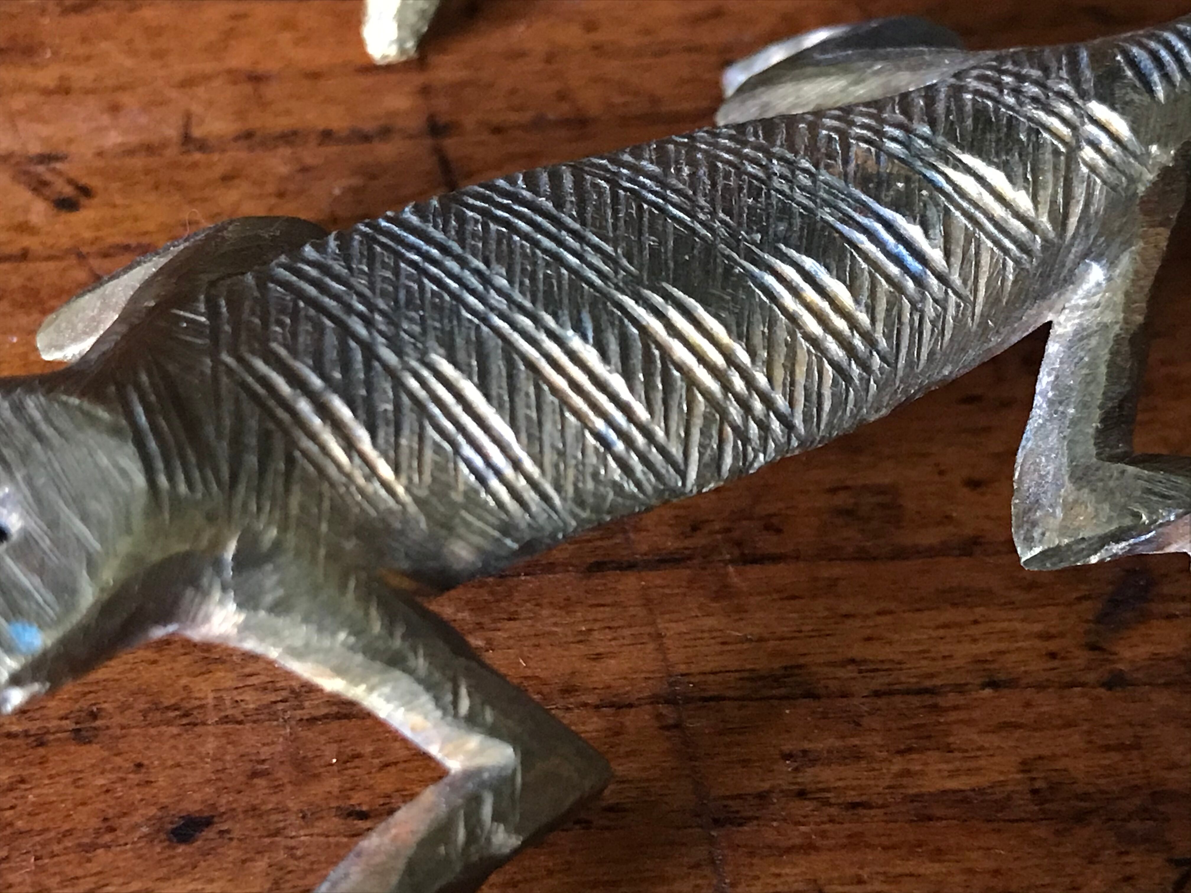 Couple of brass alligators