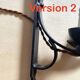 Wrought iron wall light, new fabric cabie, mirror lampshade