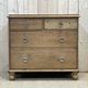 English chest of drawers in nineteenth century fir with its glass buttons