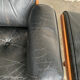 Lounge chair and ottoman black leather and teak multiplex, 1960