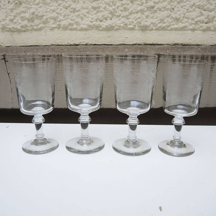 4 engraved transparent stemmed glasses by Baccarat