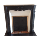 Pompadour fireplace in black marble nineteenth century.