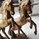 of greenhouse art deco bookends recancing unicorns. solid brass
