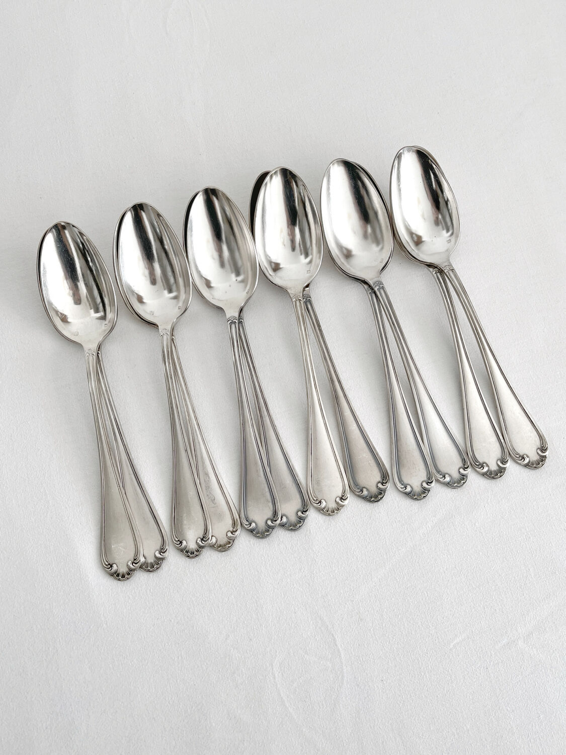 12 antique silver plated shell soup spoons