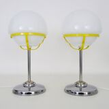 Pair of Space Age table lamps in chromed metal with opaline globe. 1970s