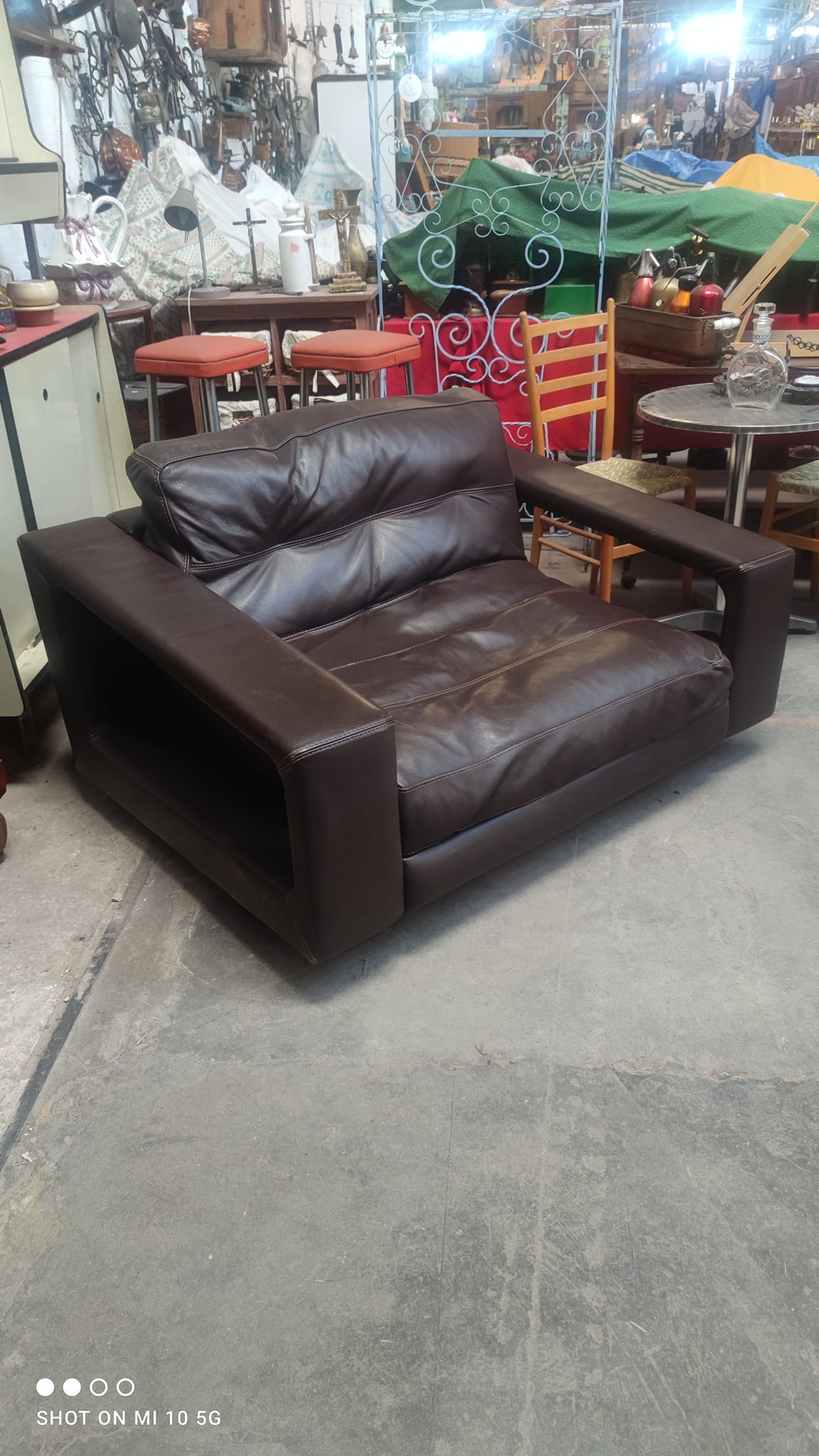 Dark brown leather armchair by Steiner, designed by Pascal Daveluy, Ranelagh model