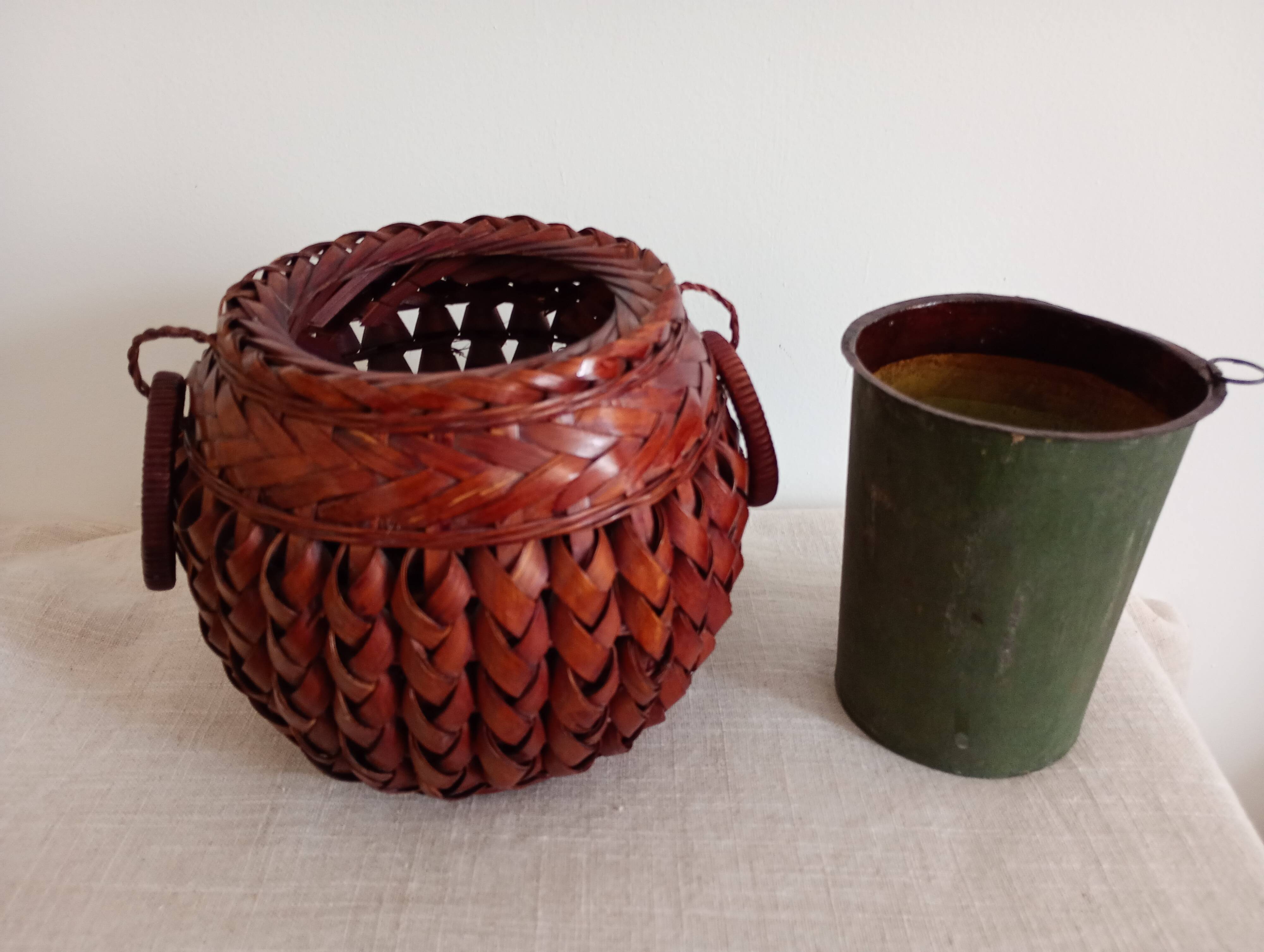 Japanese vase made of woven bamboo. Ikebana.