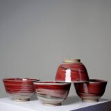 4 Japanese bowls in red glazed mixed stoneware
