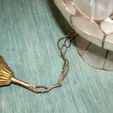 Mother-of-pearl suspension