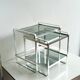 Nested tables in aluminium and smoked glass by Martini & Rossi, 1970s.