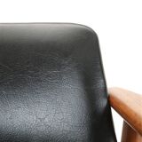 Mid Century Danish Modern teak armchair in the style of Arne Vodder