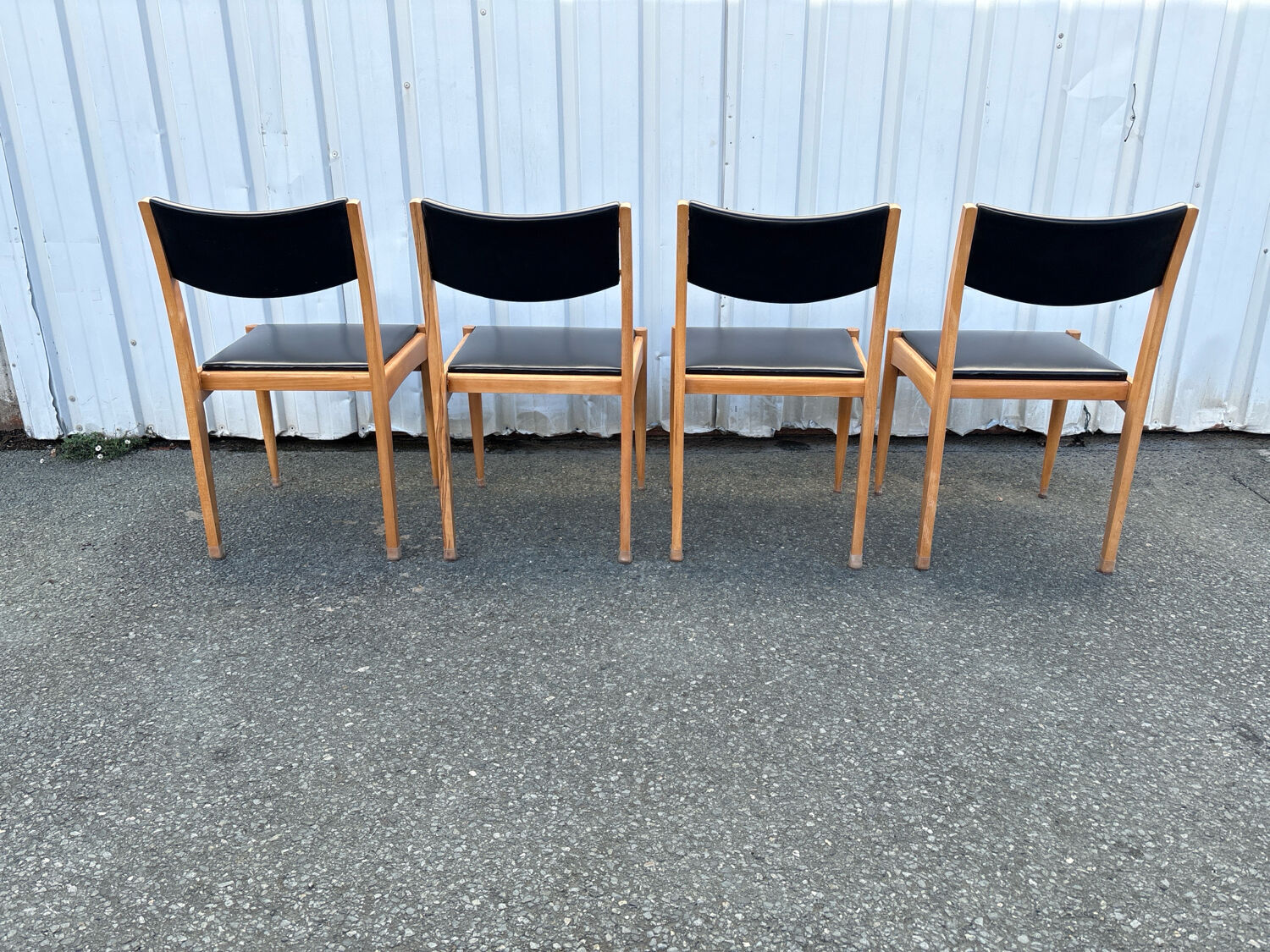 Set of 4 Scandinavian chairs in light wood and black faux leather – vintage