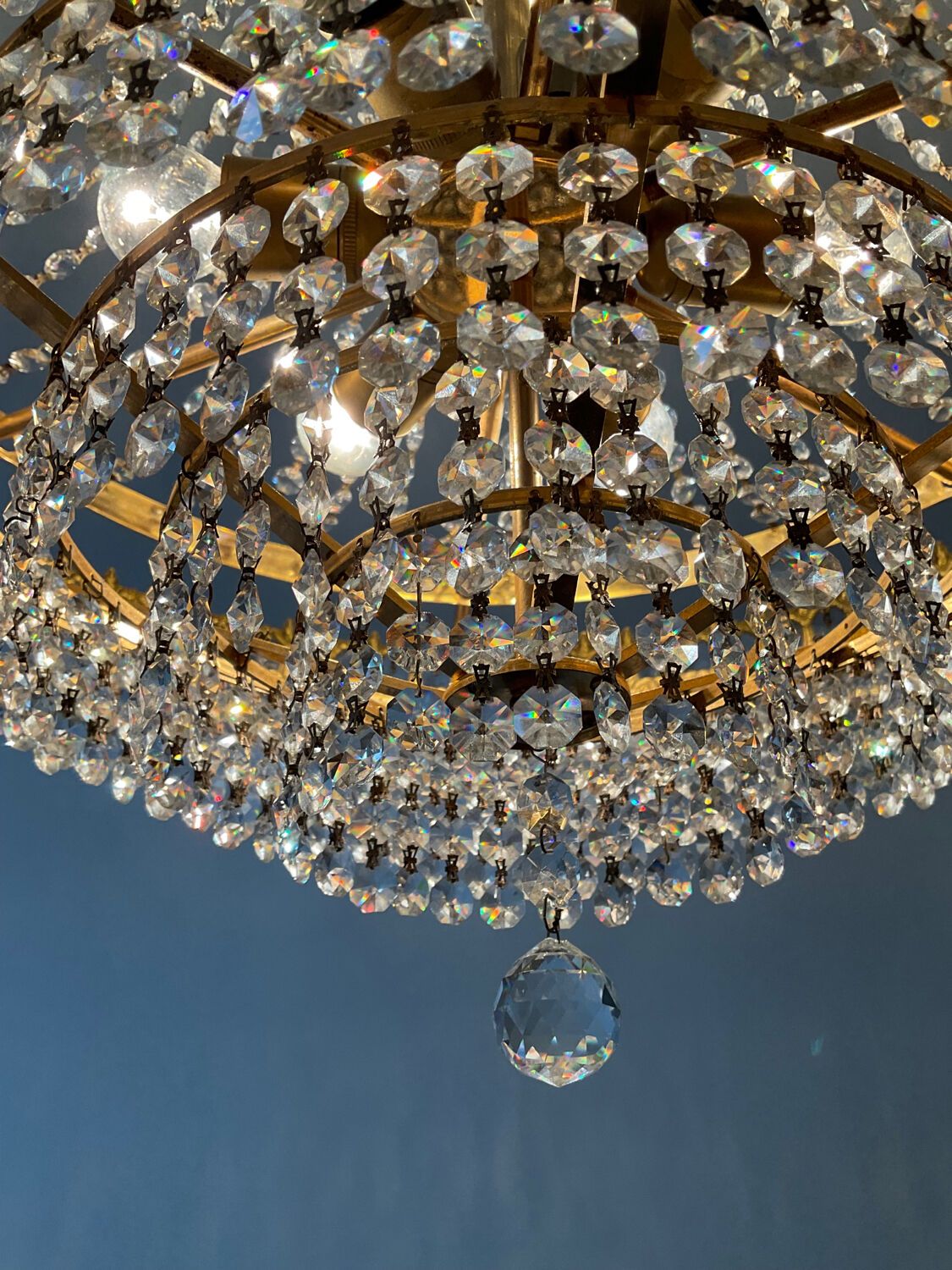 Brass chandelier and crystal tassel waterfall