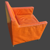 Pair of vintage orange leather armchairs