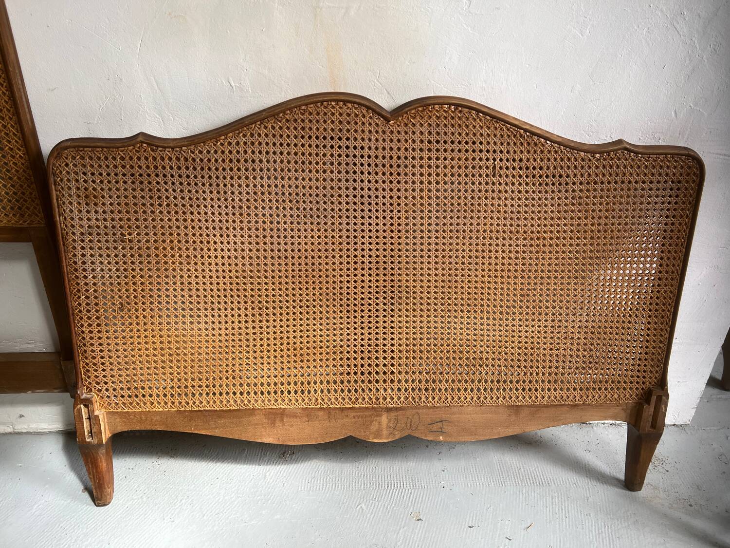 Old wooden and cane bed