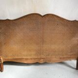 Ancien lit en bois et cannage