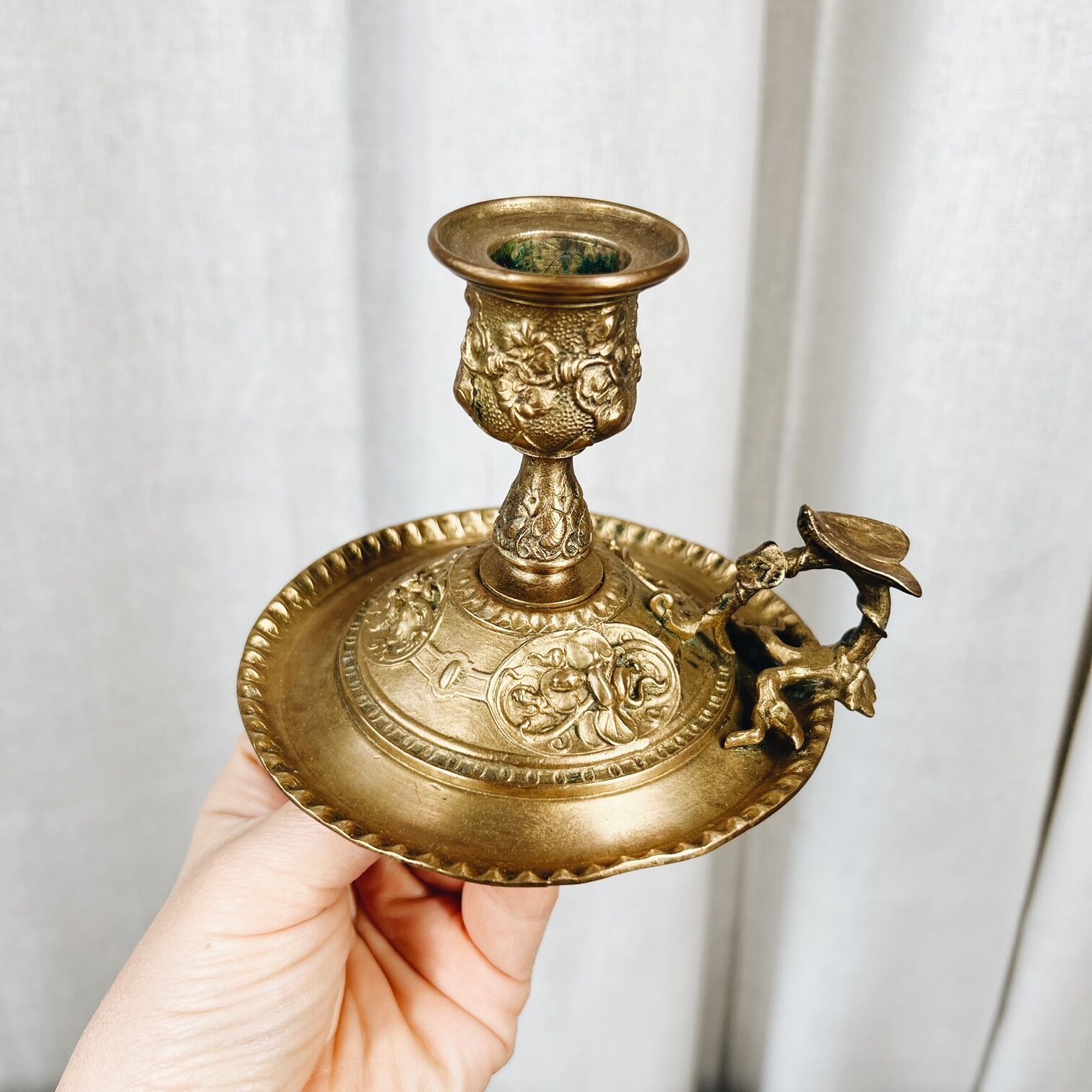 Bronze cellar rat candle holder