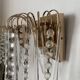 Pair of Italian wall lights Hollywood Regency with pendants and drops.