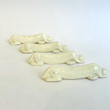 Set of 4 Art Deco knife rests, Primavera workshop