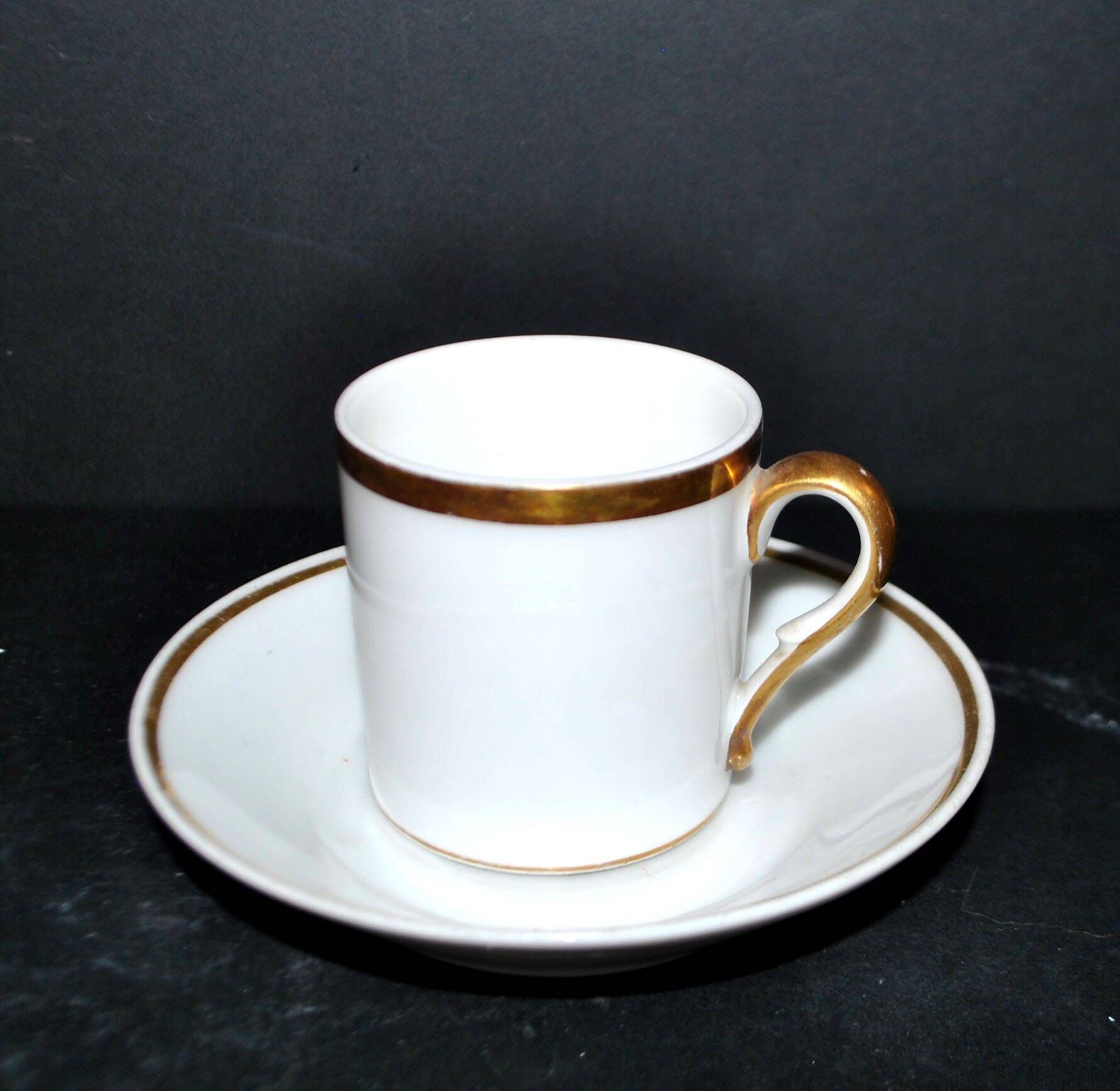 Charles Hebert Rouen porcelain – Antique litron coffee cup with gold trim.