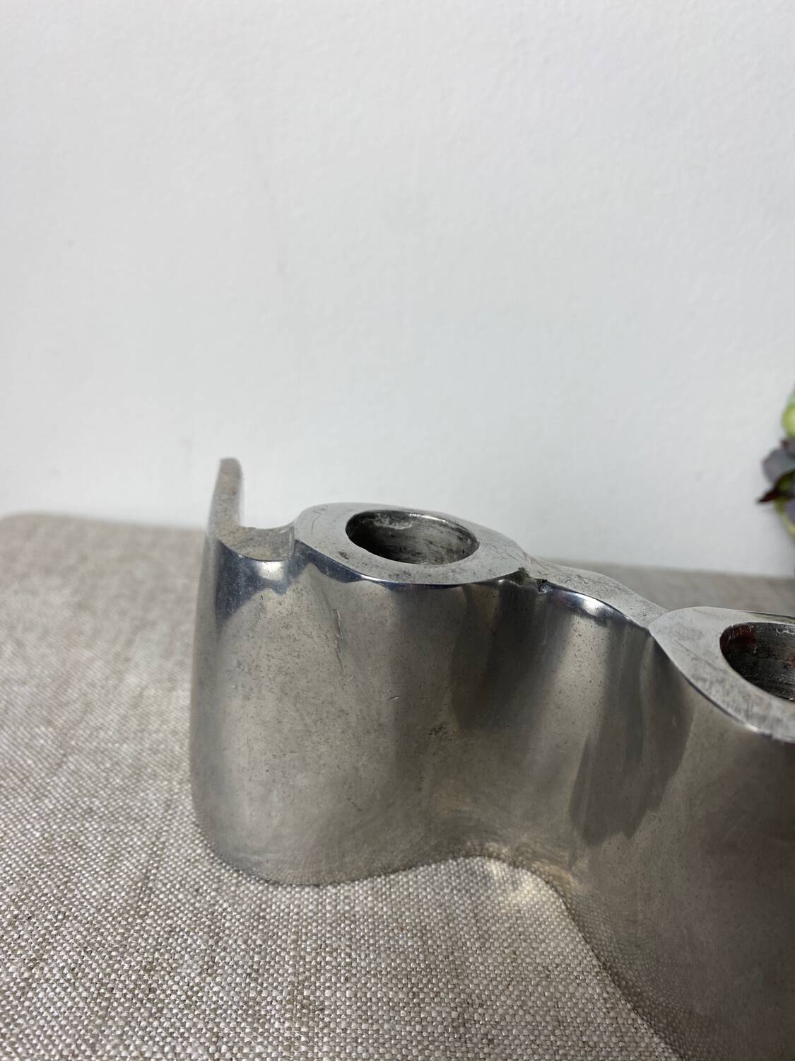 Brushed aluminum candle holder