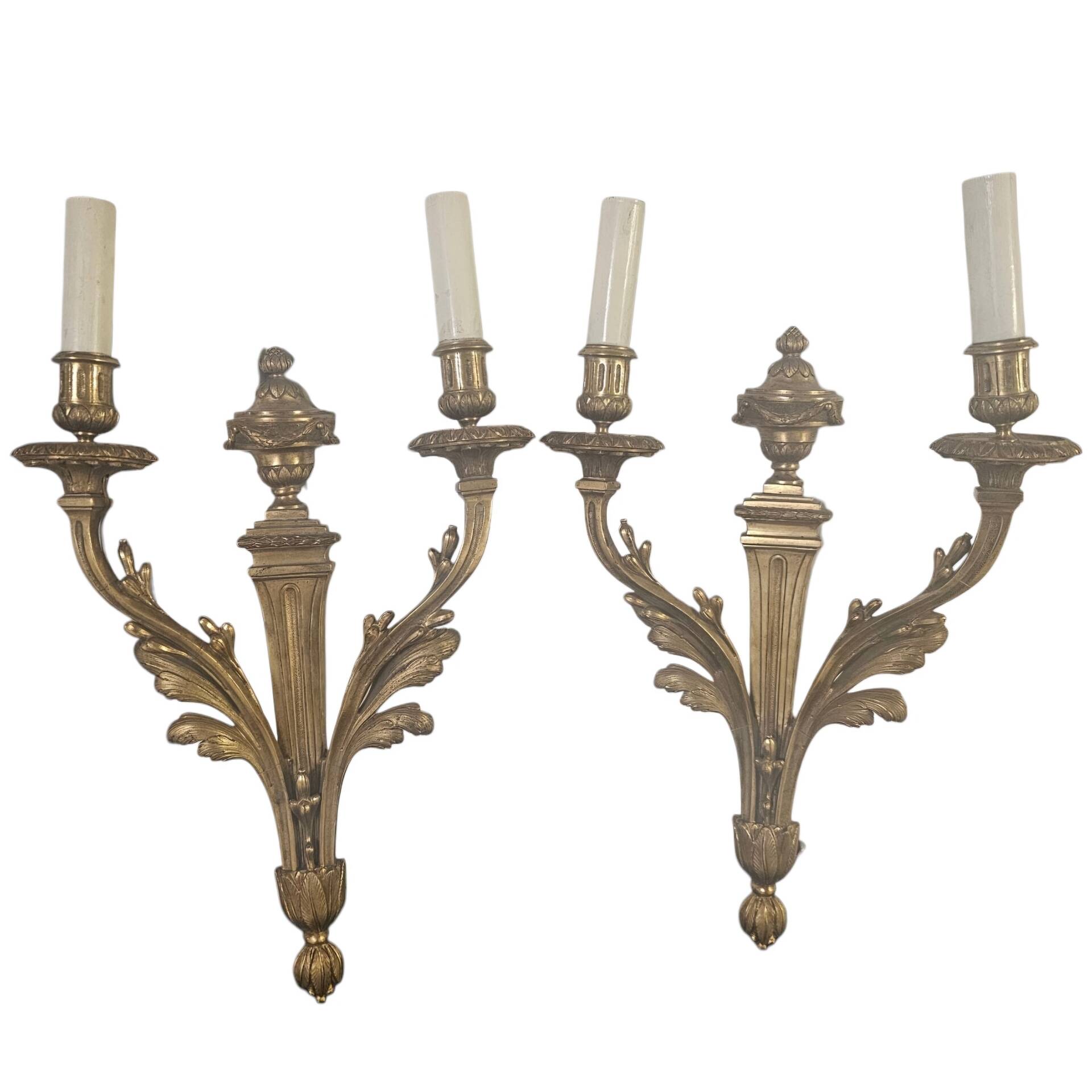 Pair of antique wall lights in Louis XVI style — Chiselled bronze — 2 arms —