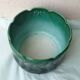 Green ceramic cache-pot