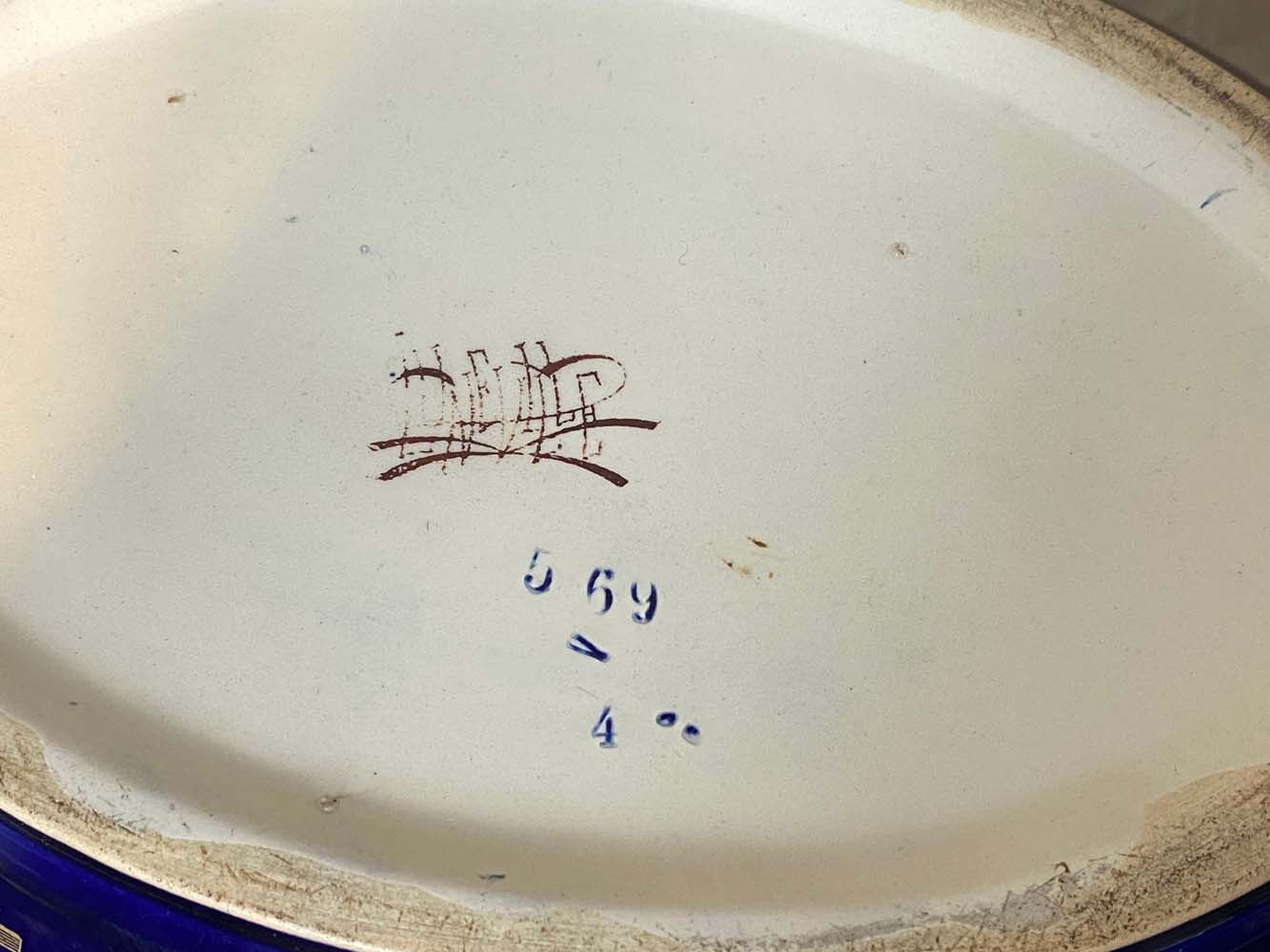 Planter signed Luneville K&G blue background