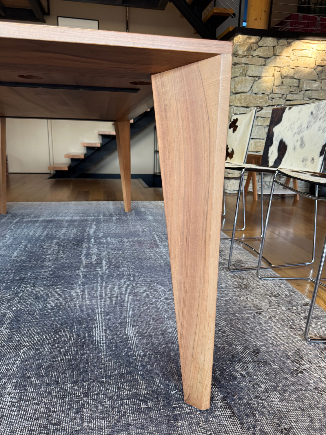 Dining table ligne roset model trapèze in solid walnut with oil finish.