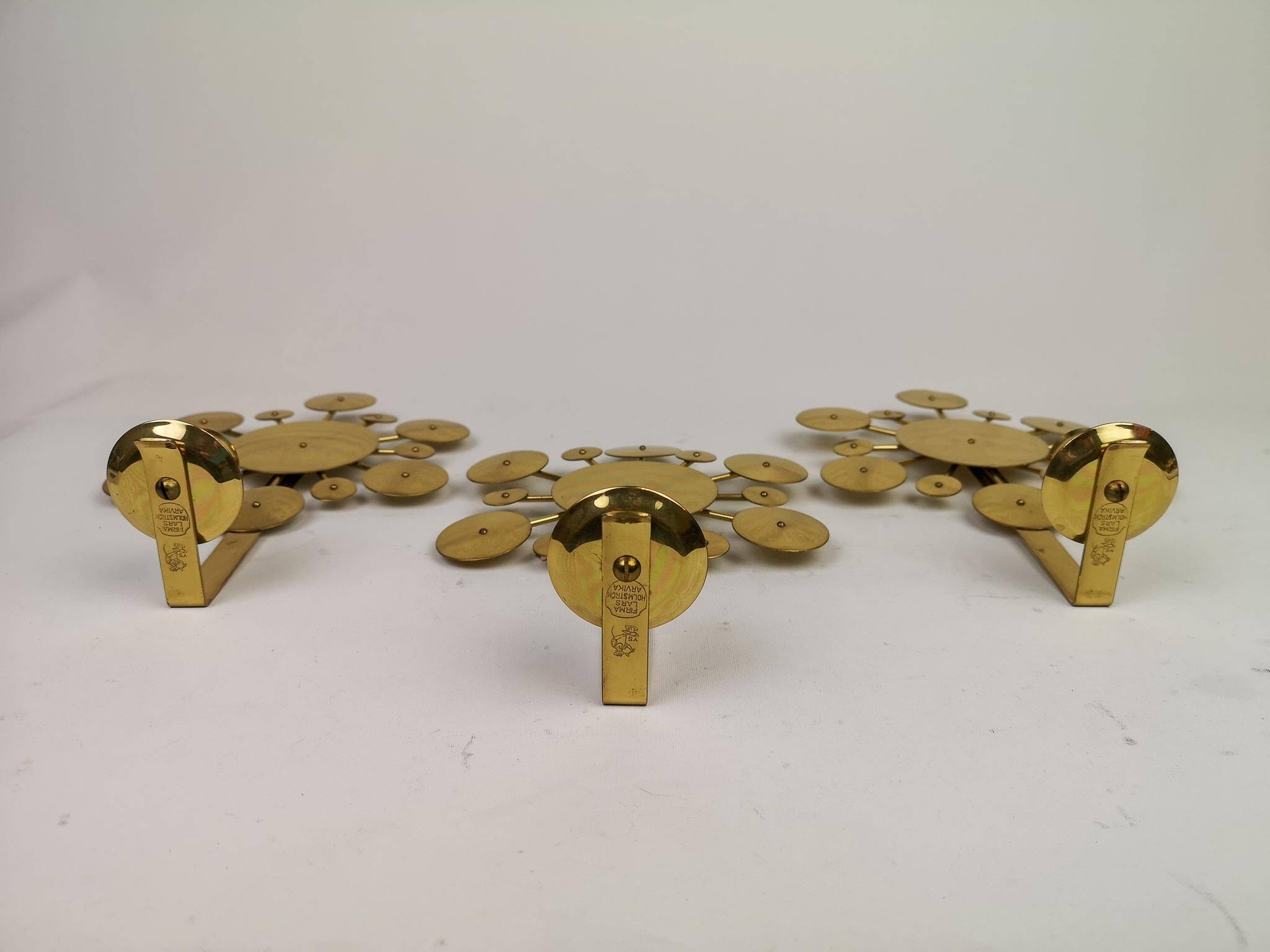 Set of 3 Wall Candle Holders in Brass "Sunburst" Holmström, Arvika, Sweden, 1960s