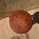 Brutalist tripod stool from the 50s in wood.