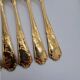 12 Table Forks in gold metal