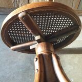 Curved wooden piano stool