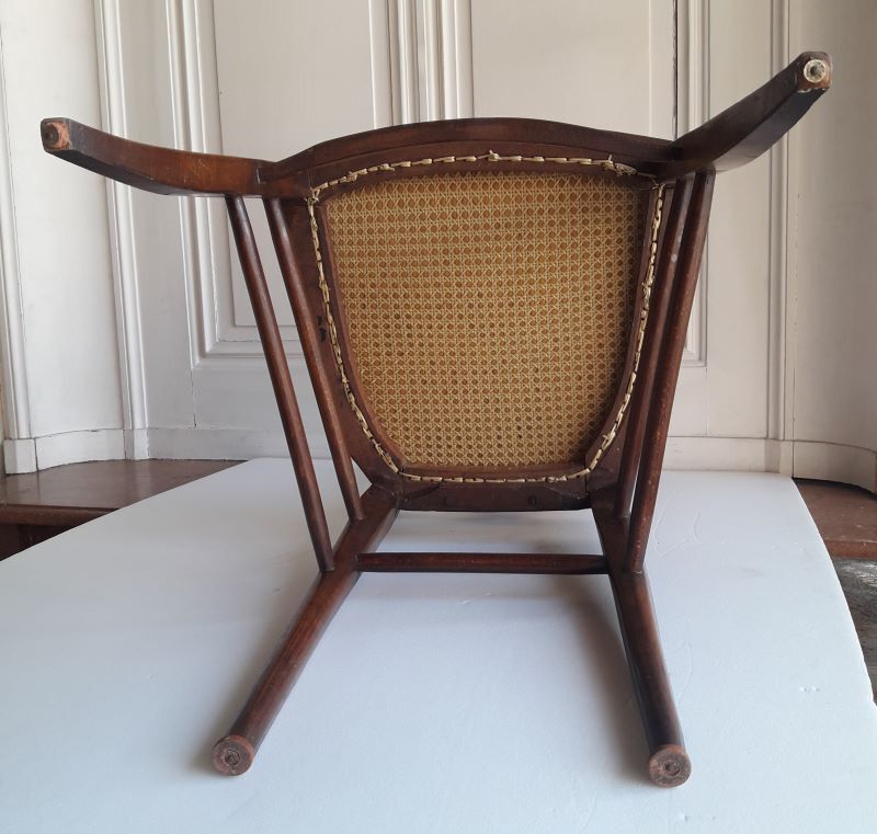 Carpeted chair at the beginning of the 20th century