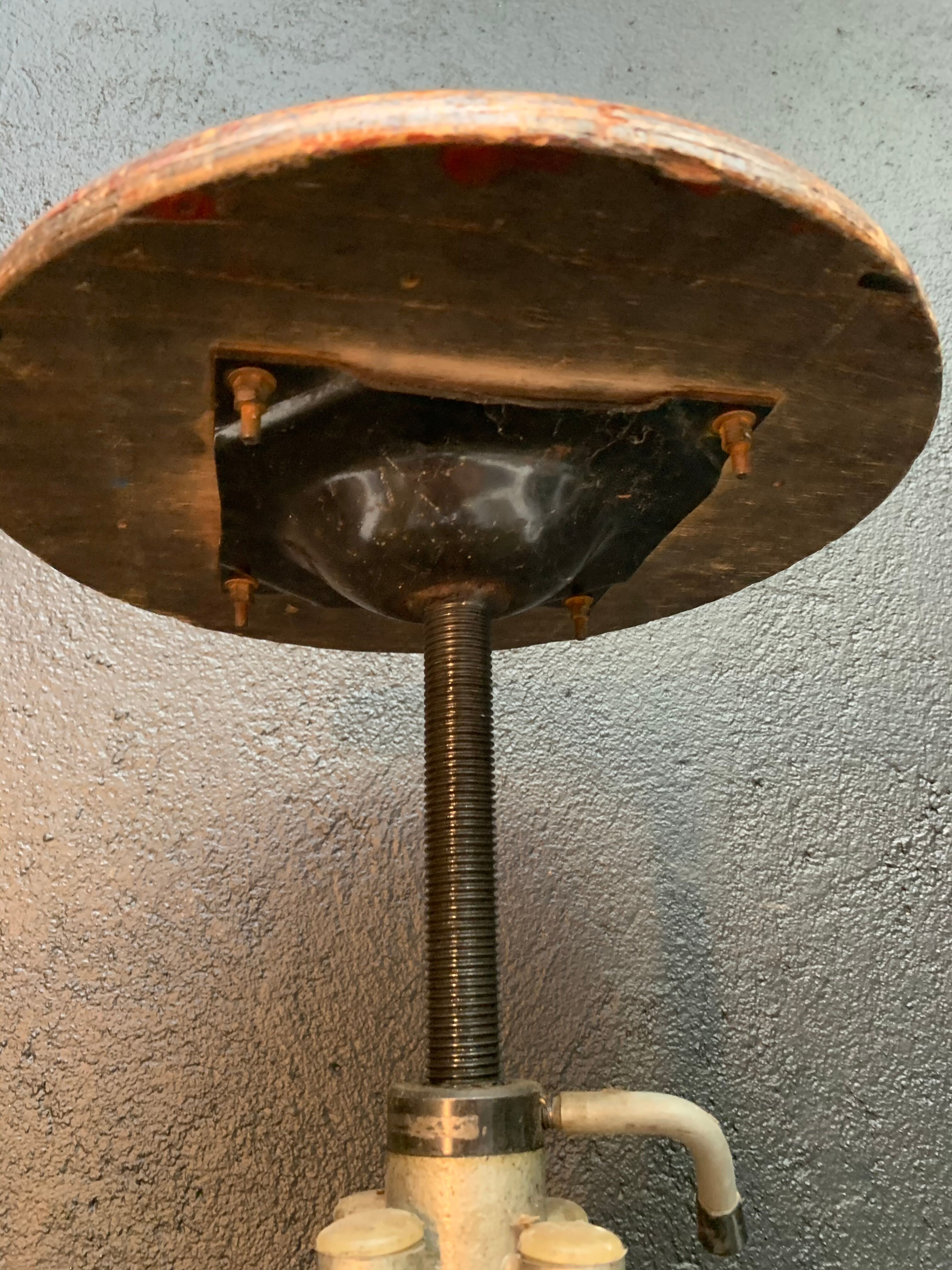 Old adjustable workshop stool