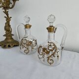 Paire de carafes Cristallerie Baccarat cristal blanc peint à l'or fin, Art Nouveau, 1900