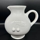 white ceramic cherry jug