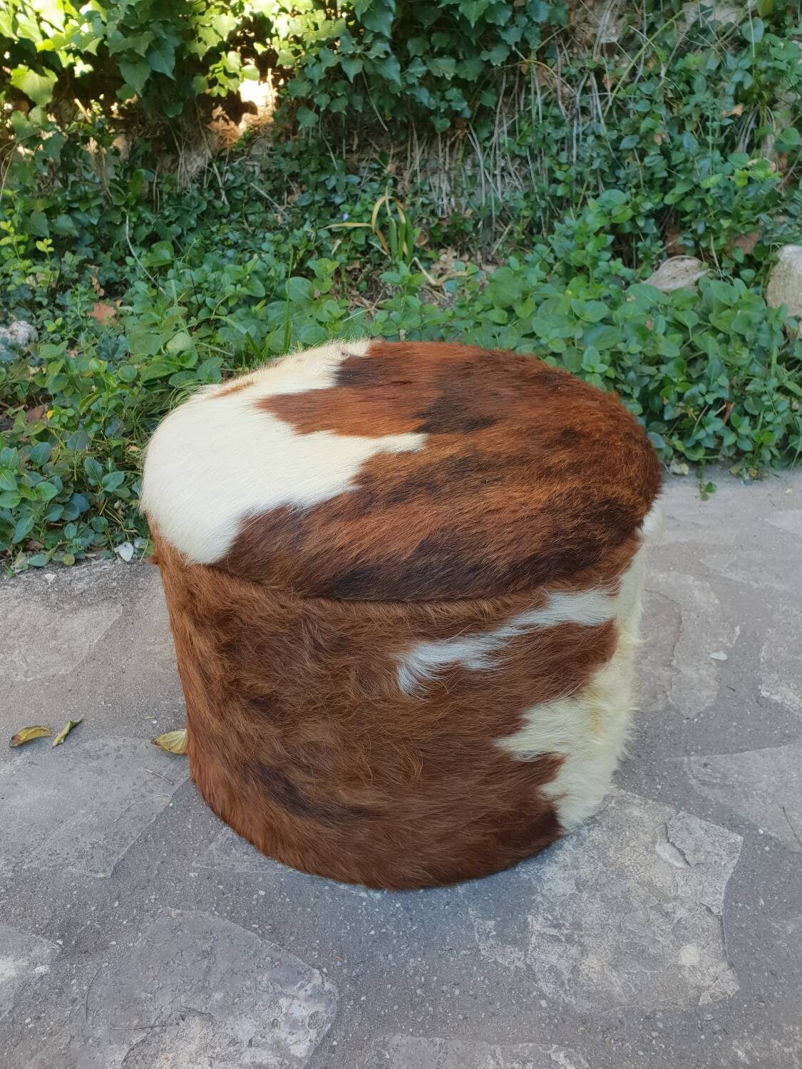 Cowhide chest pouf, 1970